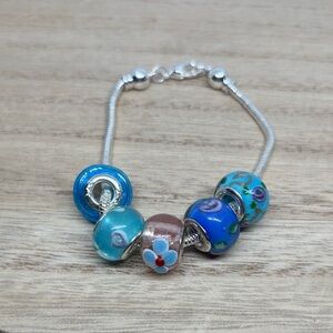 Silver Charm Bracelet with Blue Glass Beads